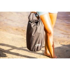 Exodry LT Dry Bag 11 Exodry LT Dry Bag -Boating Store ExodryLTBlackDryBagLifestyle2 PelicanAccessories